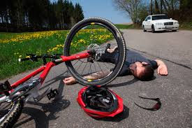 man on the ground, bicycle accident