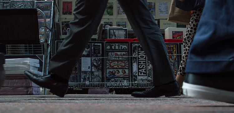 people walking on the street, focus on shoes