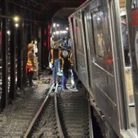 A professional negligence lawyer gathers evidence at a public transit accident scene in New York A professional negligence lawyer gathers evidence at a public transit accident scene in New York