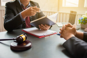 Injured victim consulting with a bus accident attorney